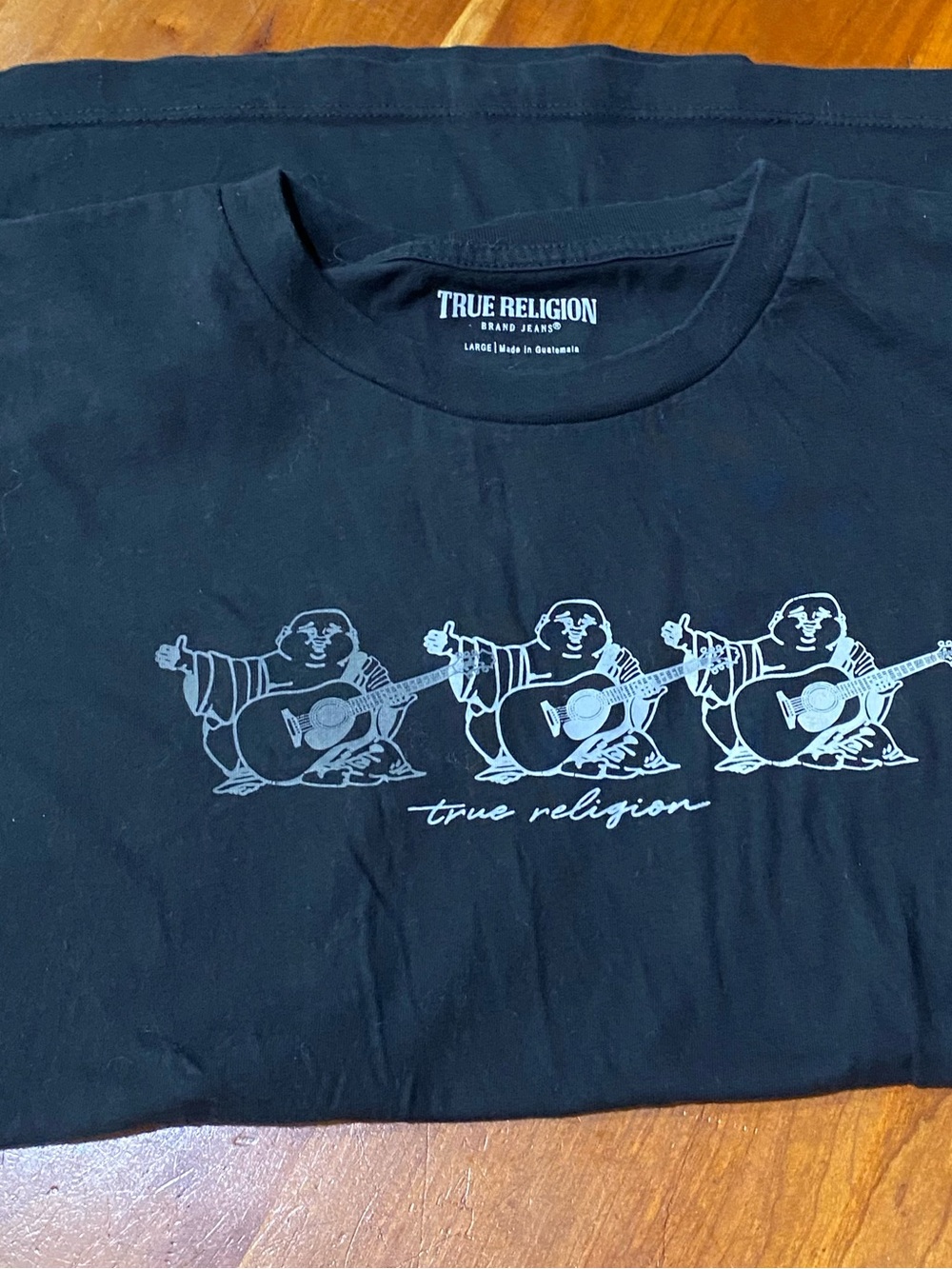 True Religion Black Tee with Light Gray Buddha Guitar Graphic
